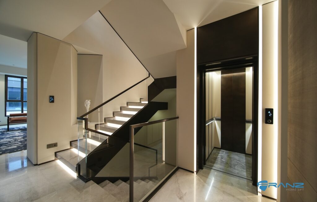 Modern staircase and elevator entrance.